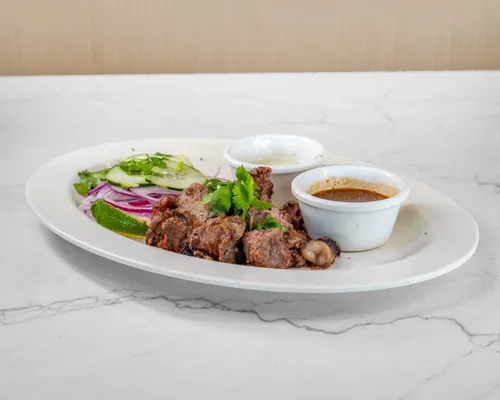 Beef boti with charbi, onions, cucumber and sauces