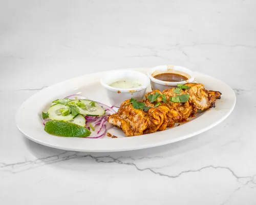 Chicken Bihari with salad and sauces