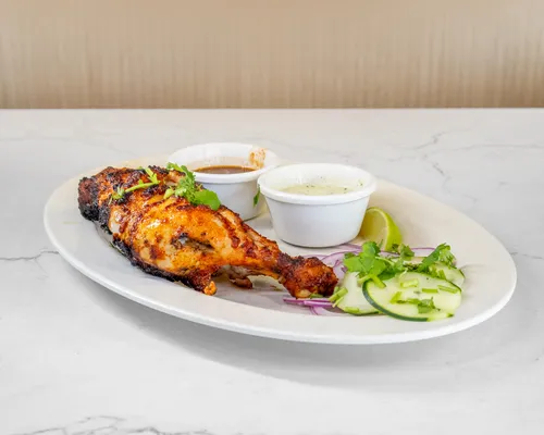 Chicken tikka with fresh salad and yogurt sauce