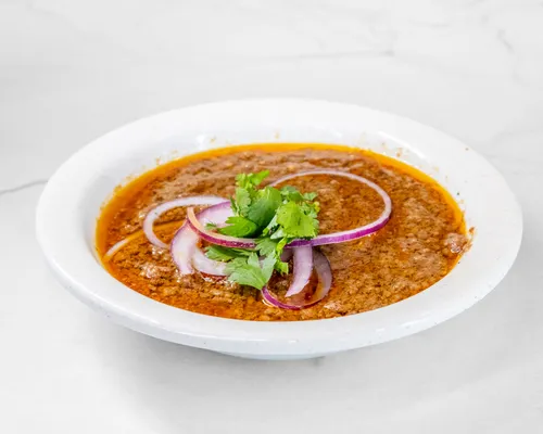 Fry kabab plate with onions, lemon and sauce
